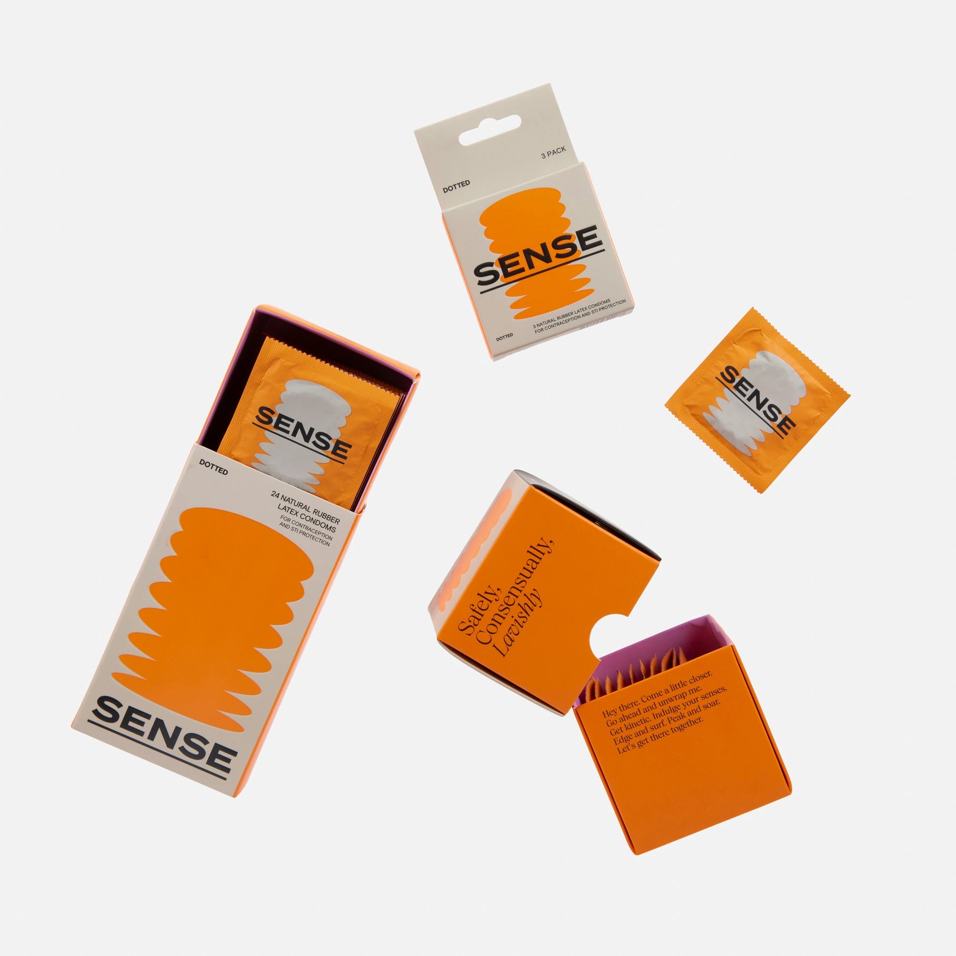 Different presentations of sense dotted natural rubber latex condoms packs opened