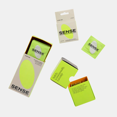 Different presentations of sense ultra thin natural rubber latex condoms packs opened
