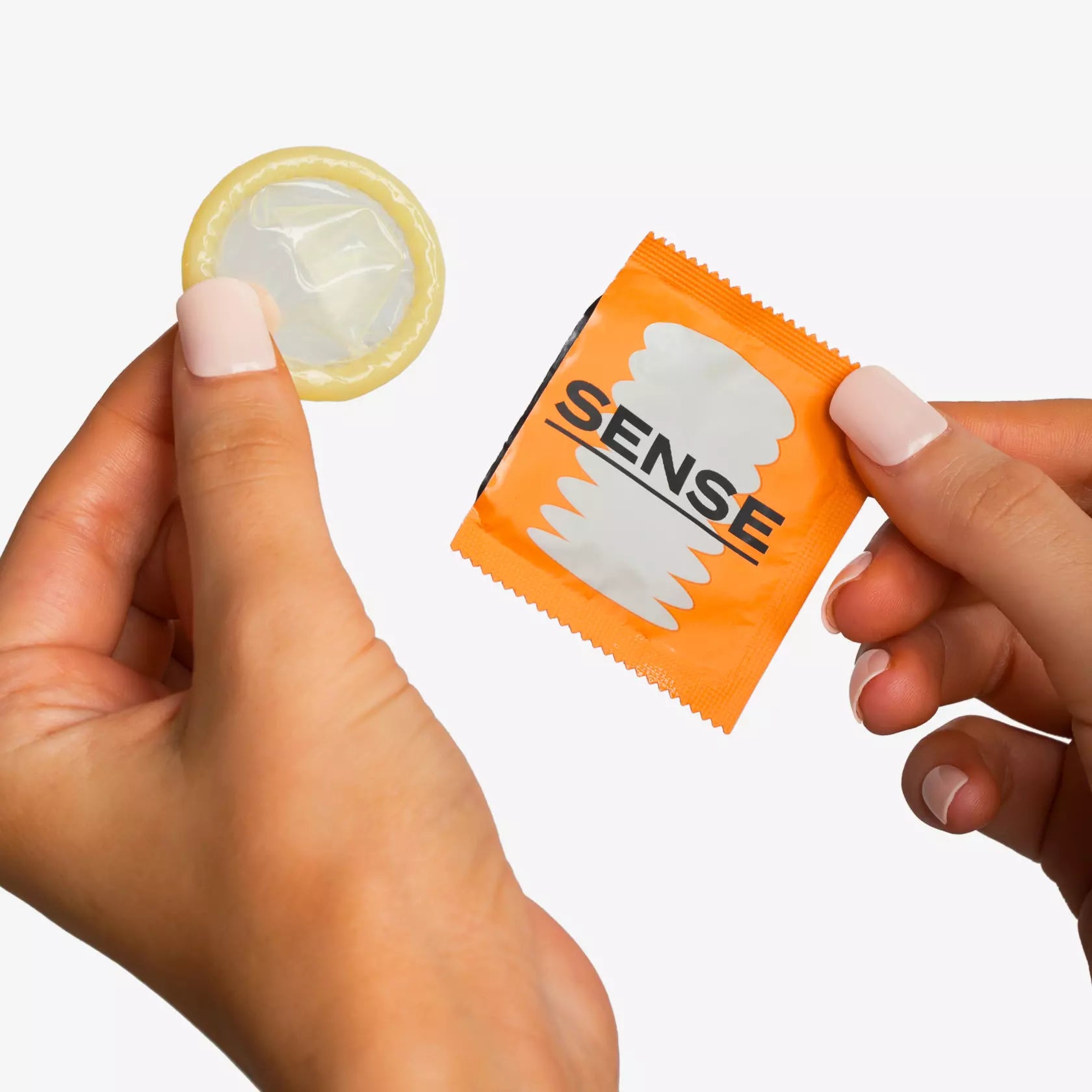 Sense dotted natural rubber latex condoms open