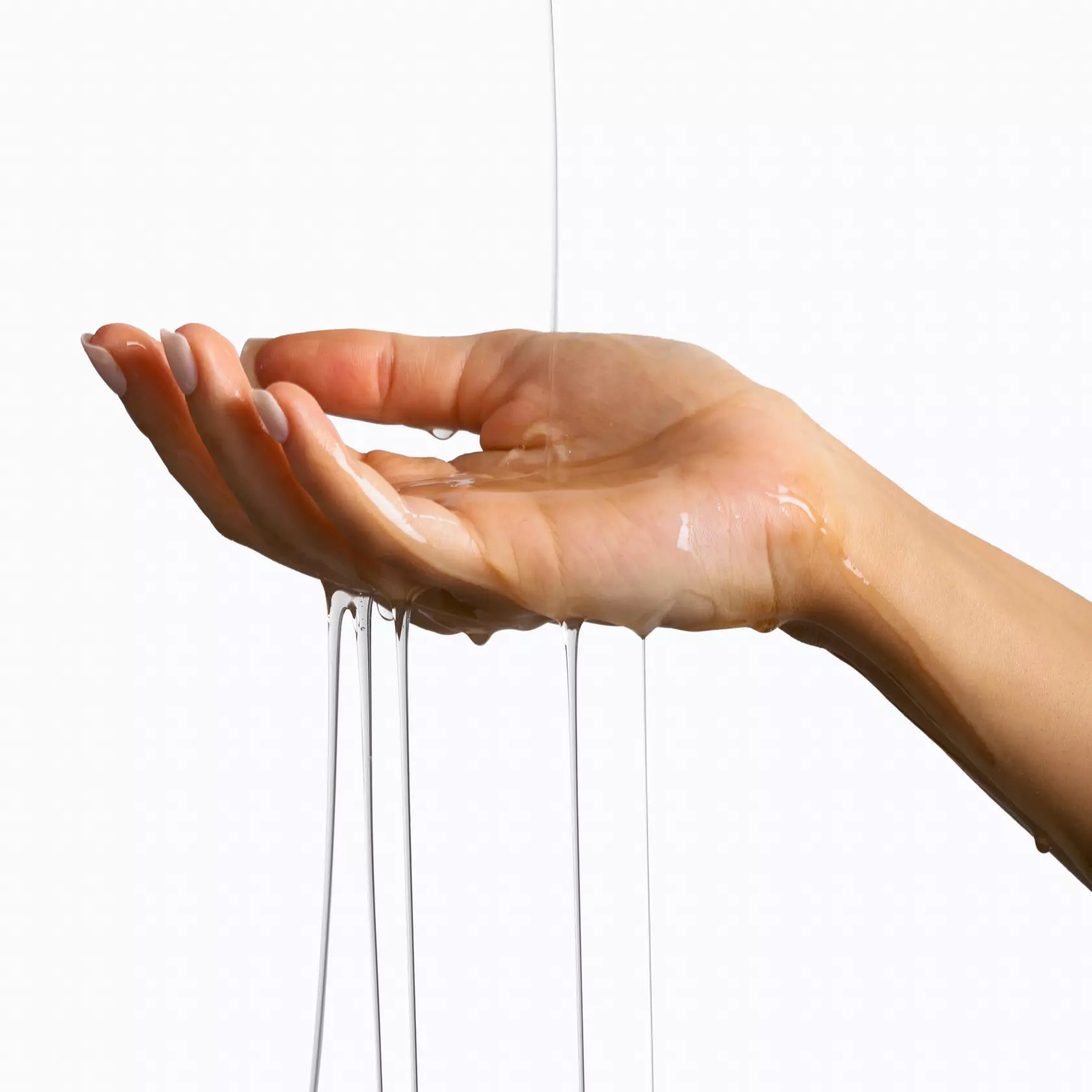 Woman hand with sense water based lubricant all over it